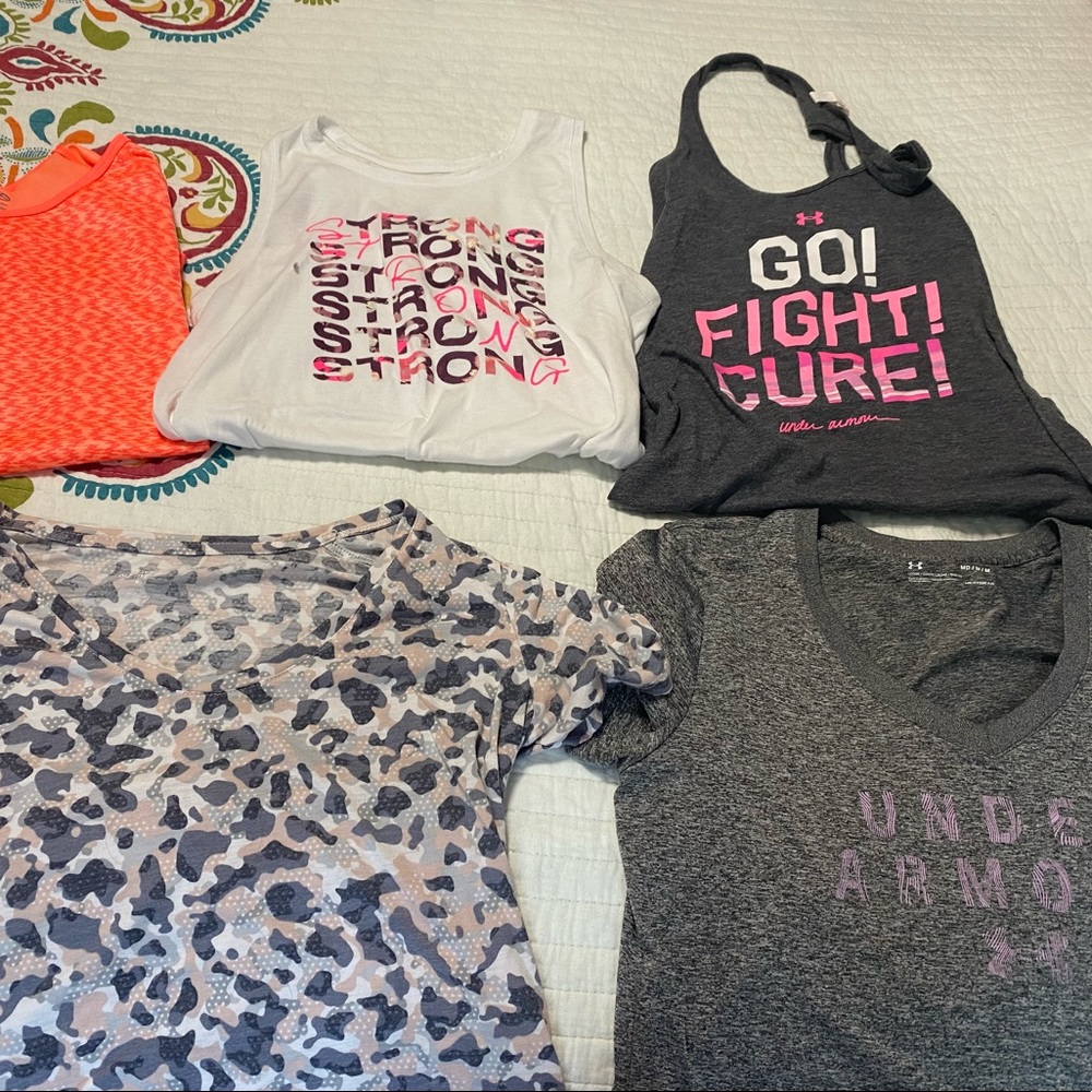 Workout shirts 4 medium and 1 large